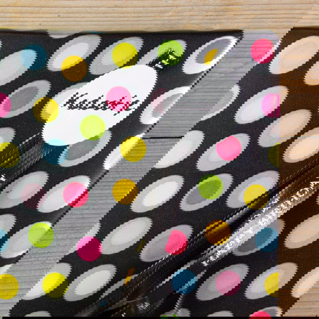 Zwart inpakpapier met stippen - Kadopapier.net